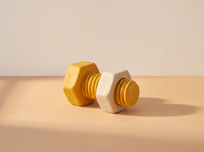 Un boulon et son écrou en pâte jaune, posés côte à côte.