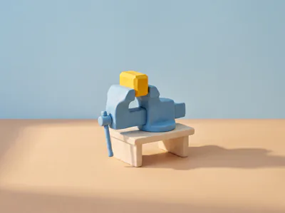 Un étau d’atelier bleu en pâte qui serre une pièce jaune.